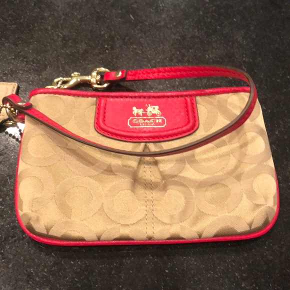Coach Handbags - Like new coach wristlet .
